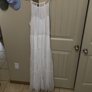 I am selling a white wedding dress and it has glitter all over